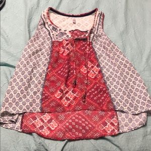 Sleeveless peasant top.